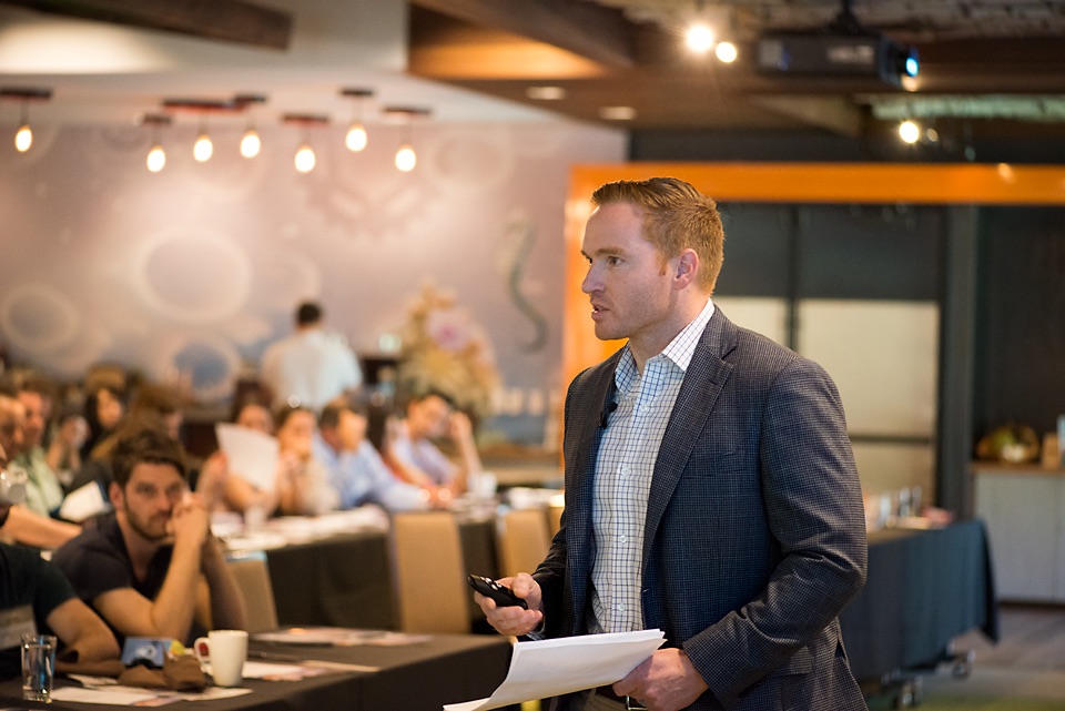 Dr. Tim Rauch lecturing to other dentists on dental implant techniques