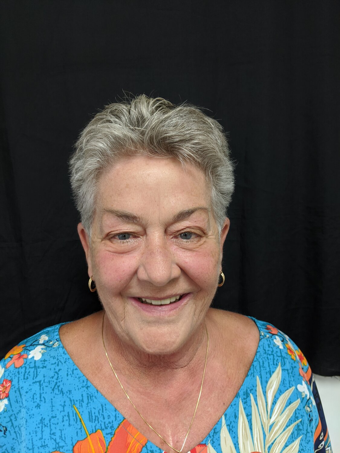 Cathy after cosmetic and restorative dentistry with Dr. Rauch