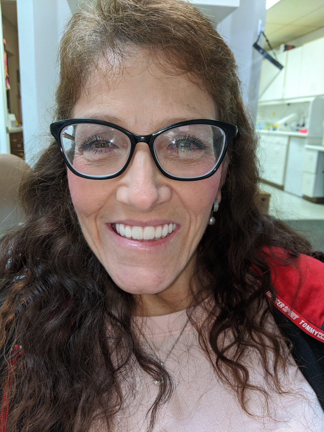 Gina after smile transformation with Dr. Rauch