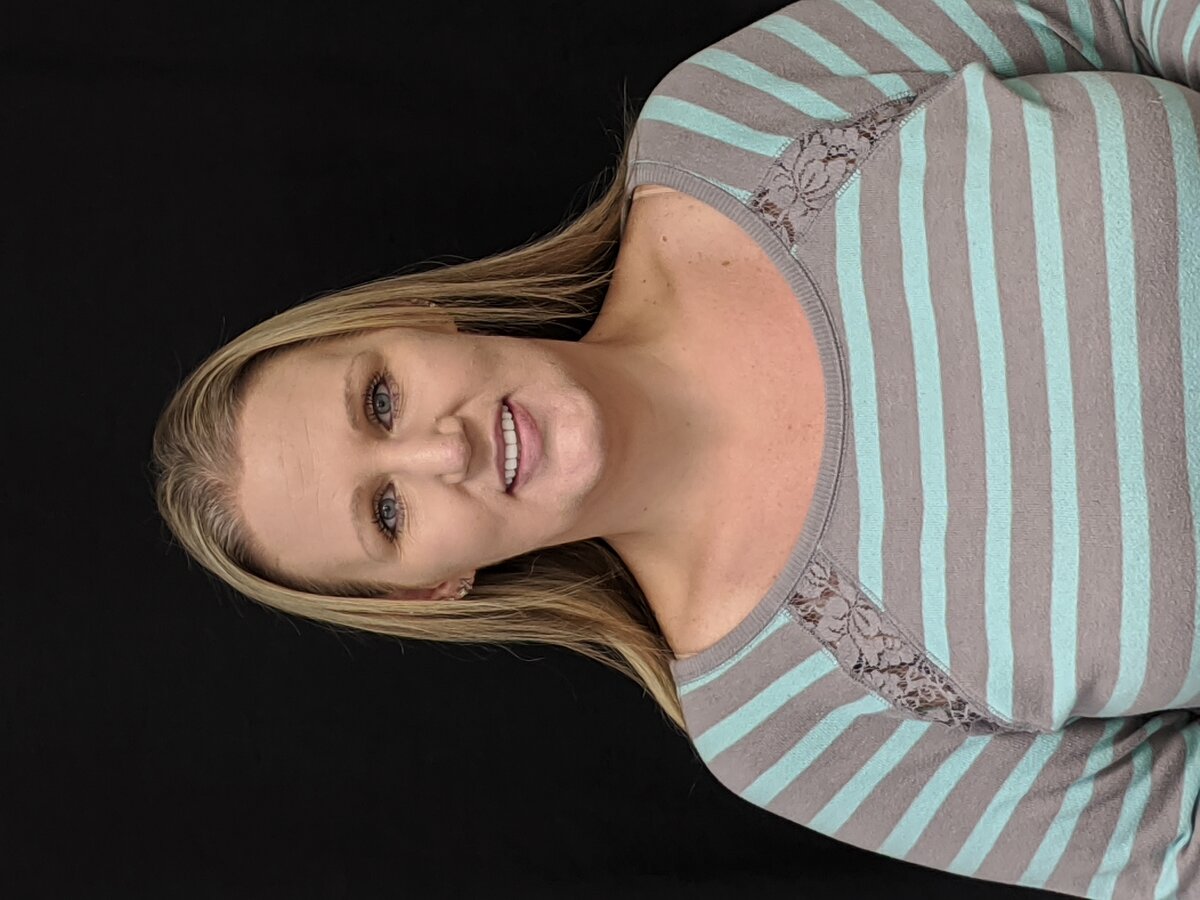Jennifer's smile after a cosmetic smile makeover with Dr. Tim Rauch in Hollister, CA